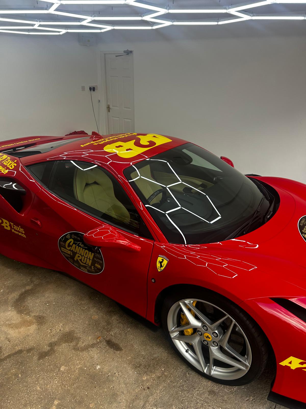 A2B Ferrari side shot with Cannon Run sticker visible